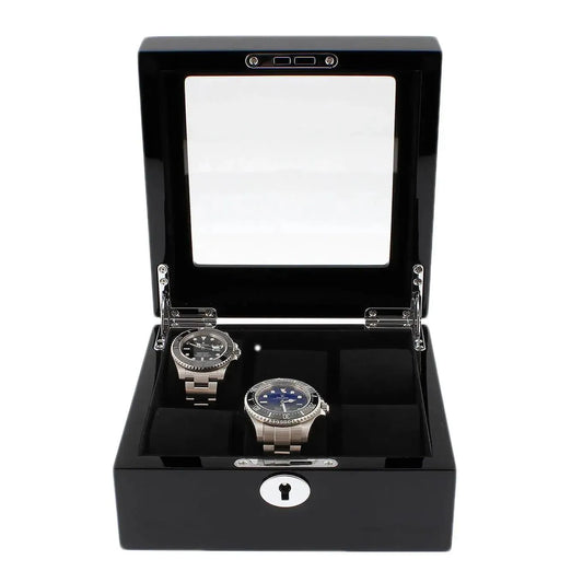 The Tempus Luxury Watch Winders 6 Watch Box in Premium Piano Black Gloss Finish with black luxury lining features a glass lid, metal hinges, and a keyhole front—shown open to display two luxury watches inside.
