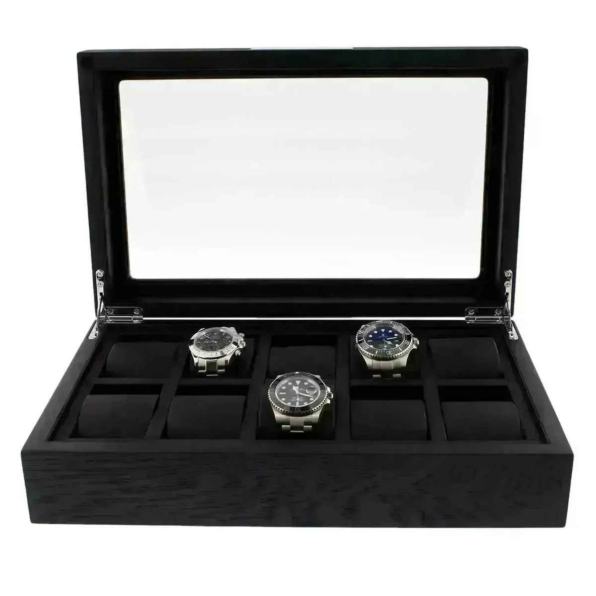 Elegant black wooden watch box with a glass lid, displaying three luxury stainless steel wristwatches on velvet cushions.