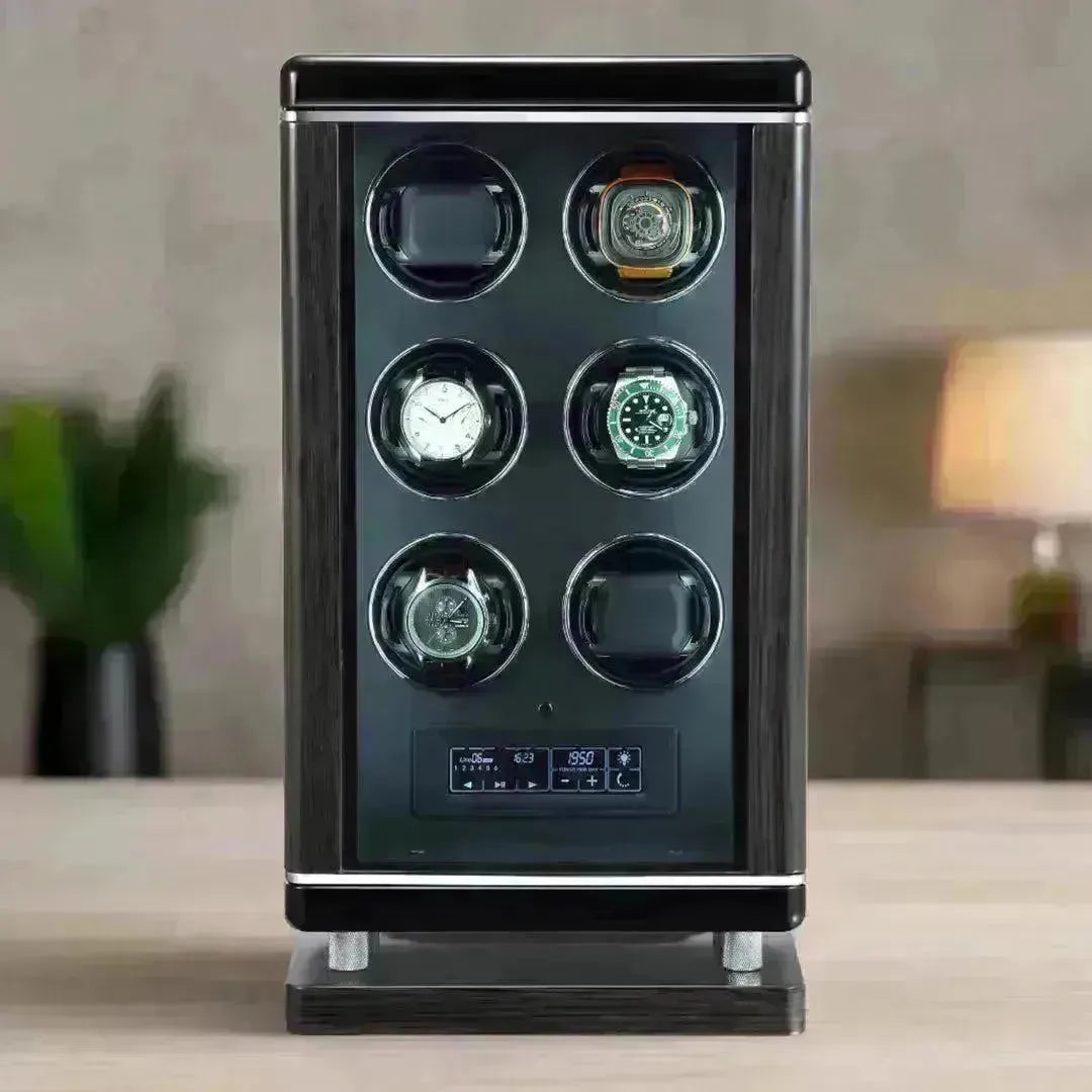 Modern black wooden watch winder with six rotating slots and a digital control panel display.