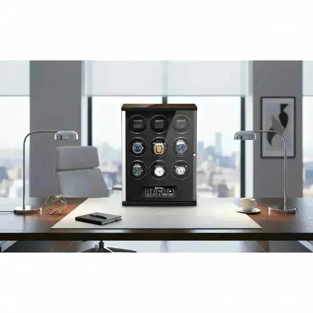 Sleek black Tempus watch winder with nine luxury watches displayed on a modern office desk.