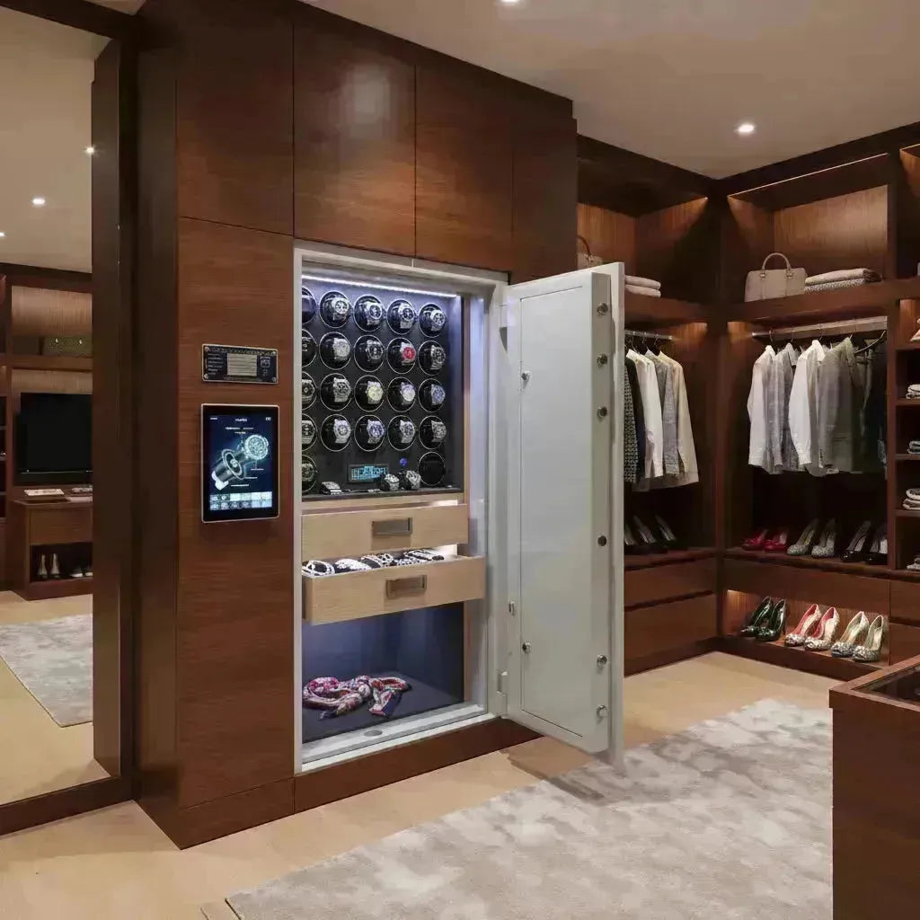 Luxurious walk-in closet with a Tempus watch winder safe, displaying multiple automatic watches and jewelry.