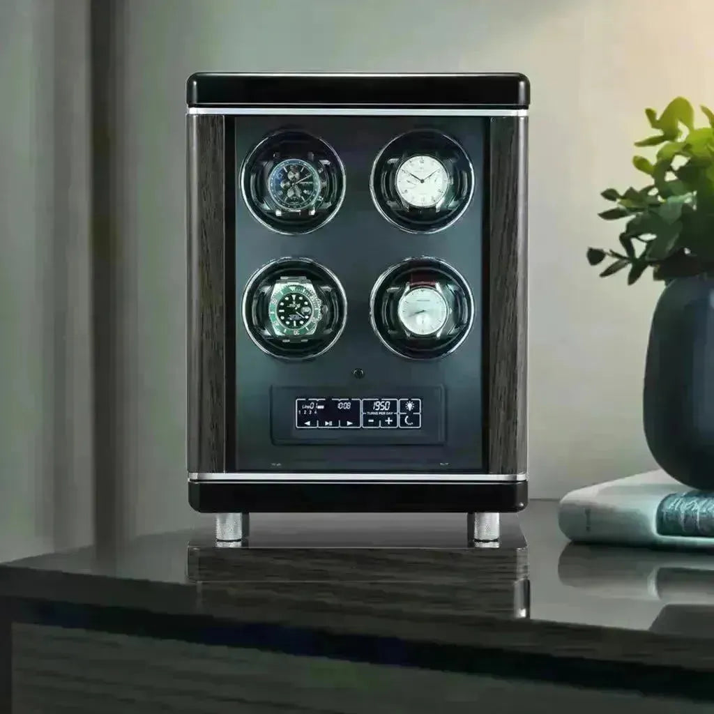 Modern dark wood and black watch winder displaying four luxury watches, with digital controls.