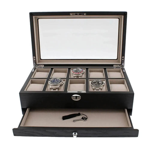 The Tempus Luxury Watch Winders 10 Watch Box in black oak veneer features a glass lid, separate compartments for watches, an empty grid, and an open storage drawer below with a key and black tassel for premium luxury watch storage.