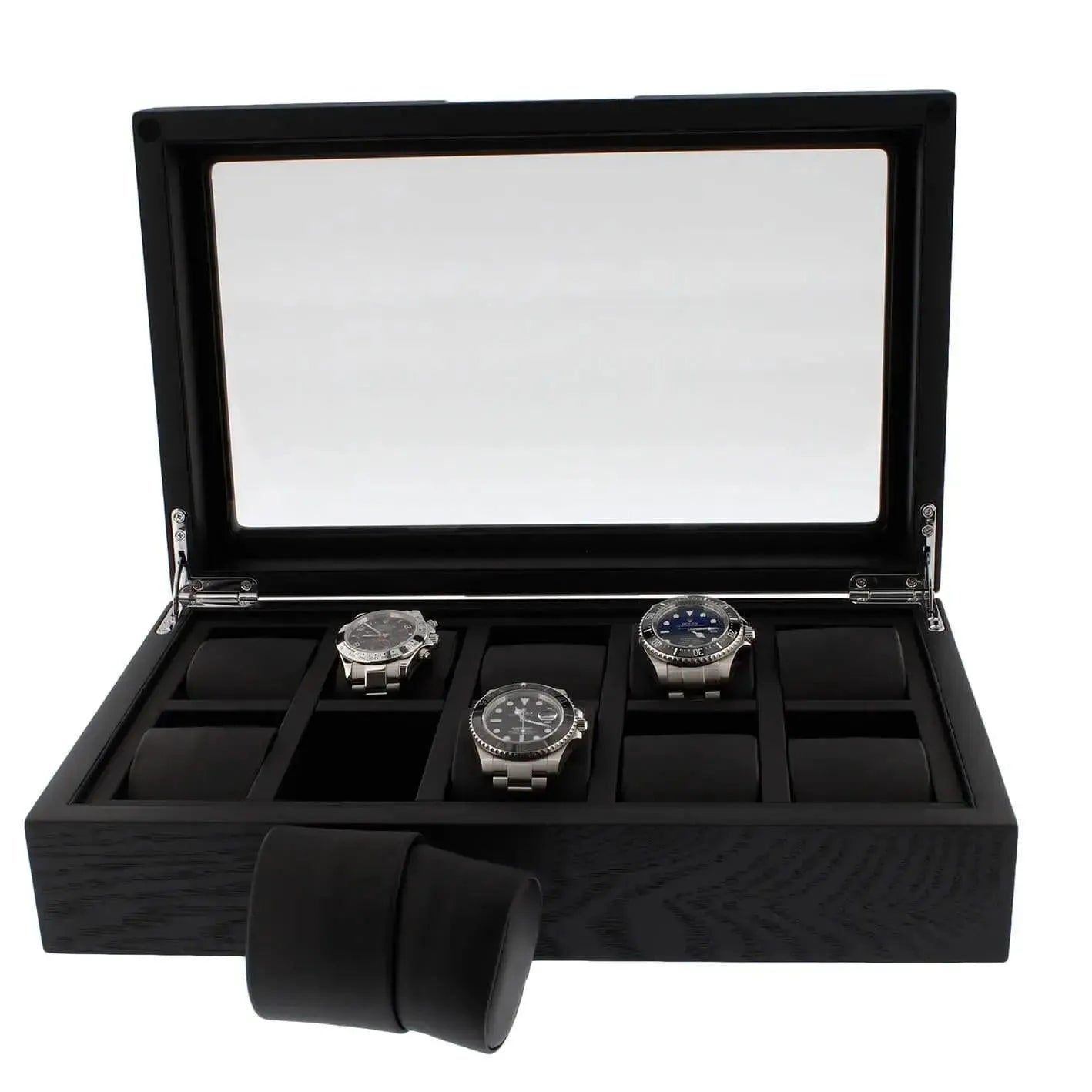 The 10 Watch Box Premium Black Oak Veneer by Tempus Luxury displays three silver wristwatches inside its glass lid, with several empty compartments and a black watch cushion from Tempus Luxury Watch Winders set outside the box.