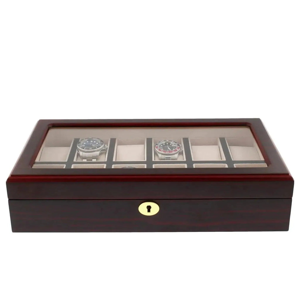 The Tempus Luxury Watch Winders 12 Watch Box features a premium cherry wood satin finish, a glass top displaying two watches, multiple light fabric-lined compartments for storage, and a secure lock.