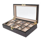 The 12 Watch Box in Premium Cherry Wood Satin Finished by Tempus Luxury Watch Winders showcases four wristwatches and one bracelet in beige-lined compartments, with a glass lid, gold hinges, lock, and ample space for your luxury collection.