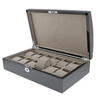 The Aevitas 12 Watch Box with Curved Solid Lid in a carbon fibre finish features multiple compartments lined with soft beige fabric, ideal for organizing watches or jewelry.
