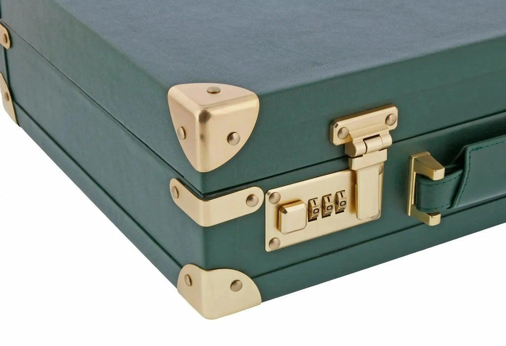 A close-up of the Tempus 15 Watch BriefCase Travel or Storage in Green Leather Finish highlights gold metal reinforcements, a combo lock, latch, and part of the handle—all against a white background.