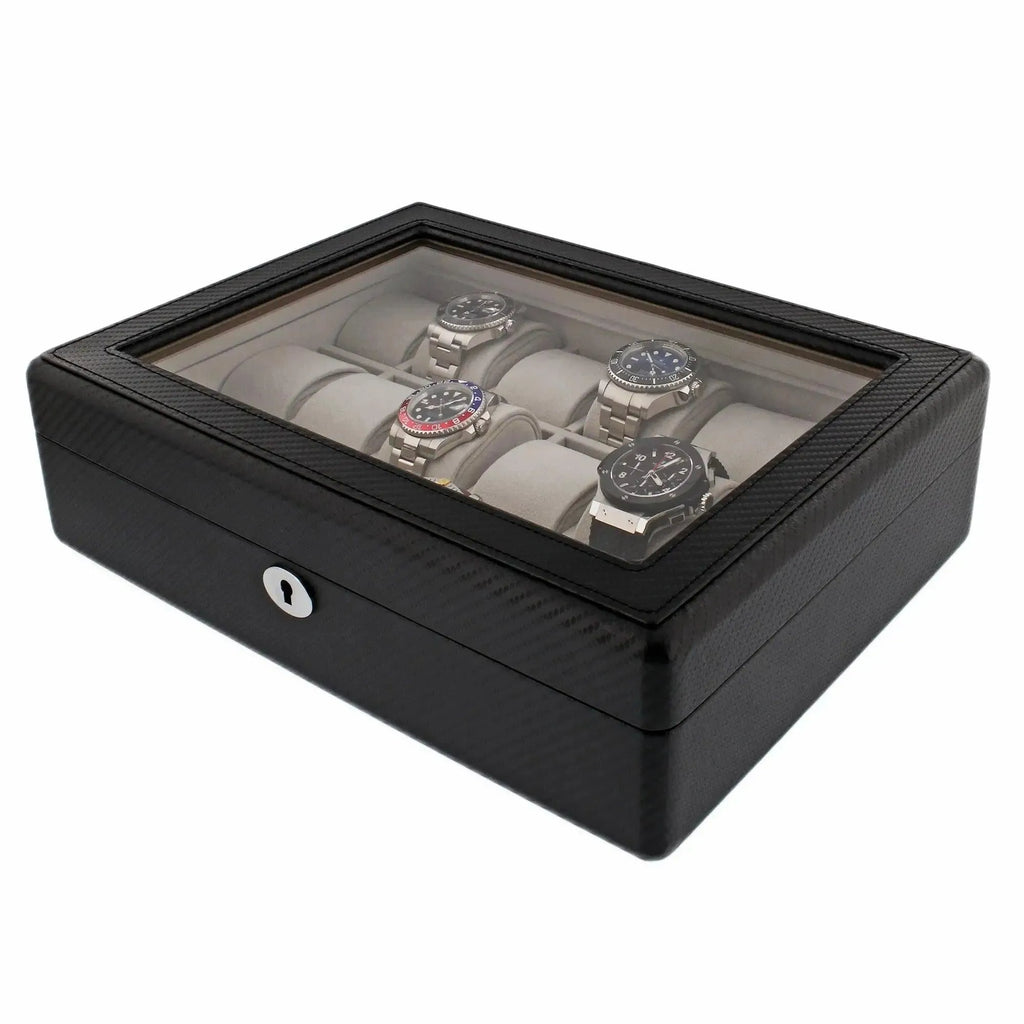 The 18 Watch Box Carbon Fibre Leather by Tempus Luxury Watch Winders features a glass top, displays up to 18 watches on cushioned holders, and offers secure locking in a sleek, textured carbon-fibre design for premium watch storage.