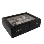 The 18 Watch Box Carbon Fibre Leather by Tempus Luxury Watch Winders features a sleek black rectangular design with a glass lid, silver hinges, and cushioned holders for luxury watch storage. Premium quality storage for up to 18 watches.