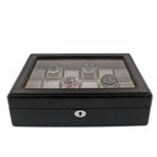 The Tempus Luxury Watch Winders 18 Watch Box features a carbon fibre leather finish, glass top, front lock, and textured design for premium luxury watch storage and display.
