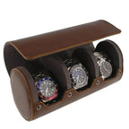  Triple Watch Roll, crafted in vintage brown leather with super soft grey suede lining, stylishly holds three watches in separate compartments—an elegant storage solution for your collection.