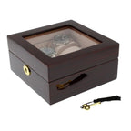 The Tempus 6 Watch Box in premium cherry wood piano gloss finish features a glass top to showcase your watches and a locking front with a tasseled key, combining elegant display with secure luxury lining.