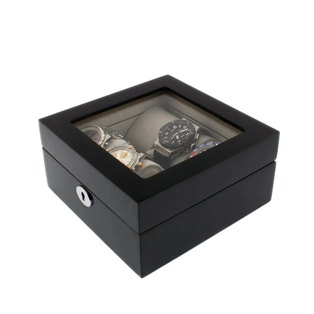 The 6 Watch Box in Premium Piano Black Gloss Finish with Grey Luxury Lining by Tempus Luxury Watch Winders showcases your timepieces through a glass top, featuring a silver keyhole and slots for six watches.