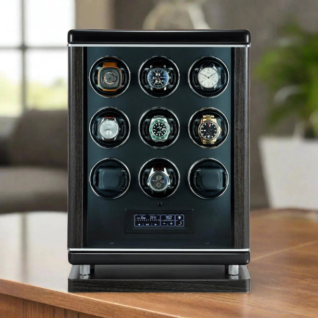 The Tempus 9 Watch Winder for Automatic Watches with BioMetric Technology by Tempus Luxury Watch Winders, in black with a premium finish, elegantly displays nine luxury wristwatches on a wooden table in a modern room.