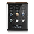 The Tempus Luxury 9 Watch Winder for Automatic Watches features touch screen technology, a black finish with wood accents, holds nine watches in circular slots, and offers a digital control panel at the front.