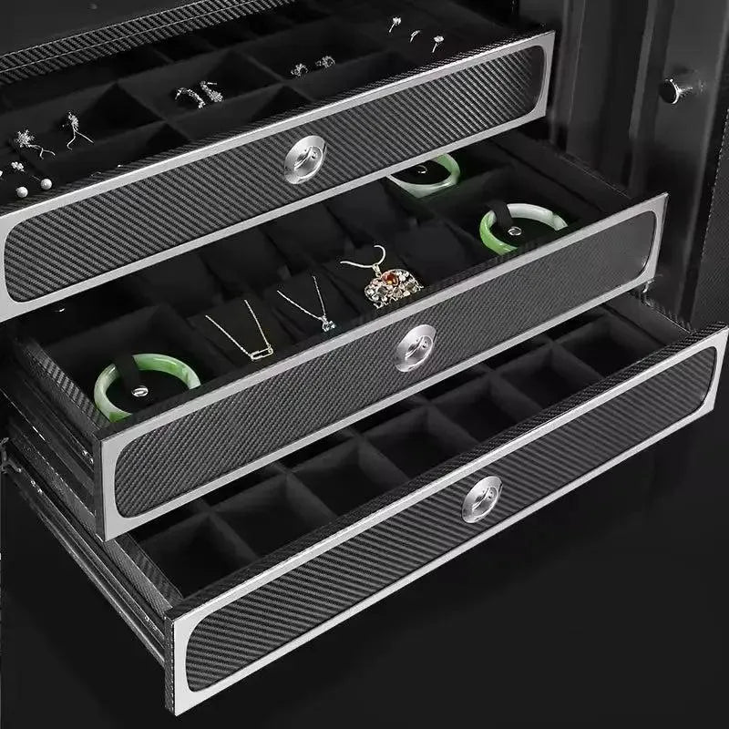 The Tempus Luxury Watch Winders’ Watch Winder Safe for 8 Watches offers extra storage with three open drawers lined with compartments for jewelry, carbon fiber-look finish, and metallic handles—matching its premium leather-wrapped design.