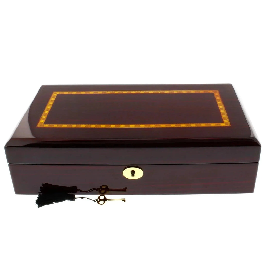 The Premium 12 Watch Box in Cherry Wood Piano Gloss Finish by Tempus Luxury Watch Winders features a decorative inlaid lid, gold keyhole, and two keys with black tassels—perfect for luxury watch storage.