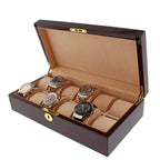 The Tempus Luxury Watch Winders Premium 12 Watch Box in Cherry Wood Piano Gloss Finish elegantly displays up to twelve wristwatches, each in its own compartment, and features a gold-colored lock with a tan velvet interior.
