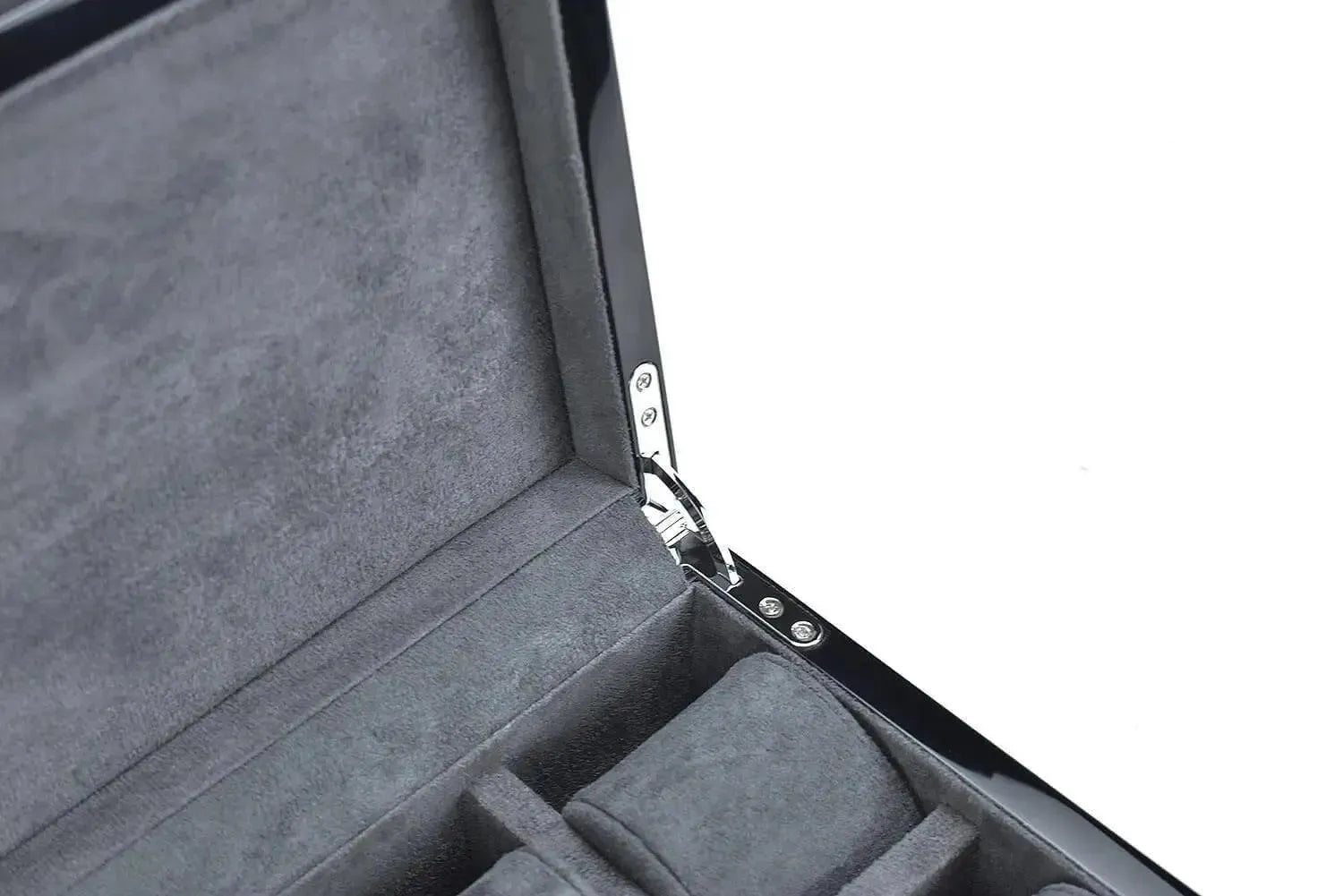 Close-up of the Tempus 10 Watch Box in Black Piano Finish with Bio Metric Lock by Tempus Luxury Watch Winders, showing 10 cushioned slots and a metal hinge against a white background.