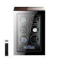 The Tempus 6 Watch Winder for Automatic Watches by Tempus Luxury Watch Winders features a glass front, displays four wristwatches, includes a digital touch screen panel at the bottom, and comes with a black remote control shown on the left.
