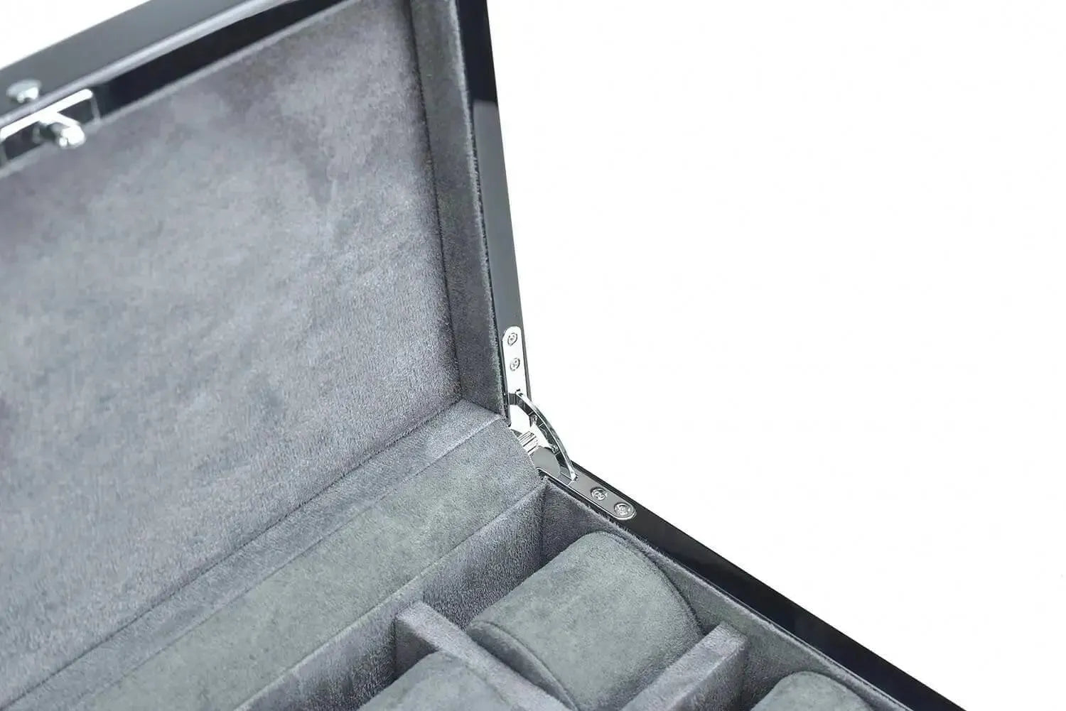 A close-up of the Tempus 8 Watch Box in Black Piano Finish by Tempus Luxury Watch Winders, showcasing its gray velvet-lined compartments and shiny metal hinge, designed for secure storage with a biometric lock.