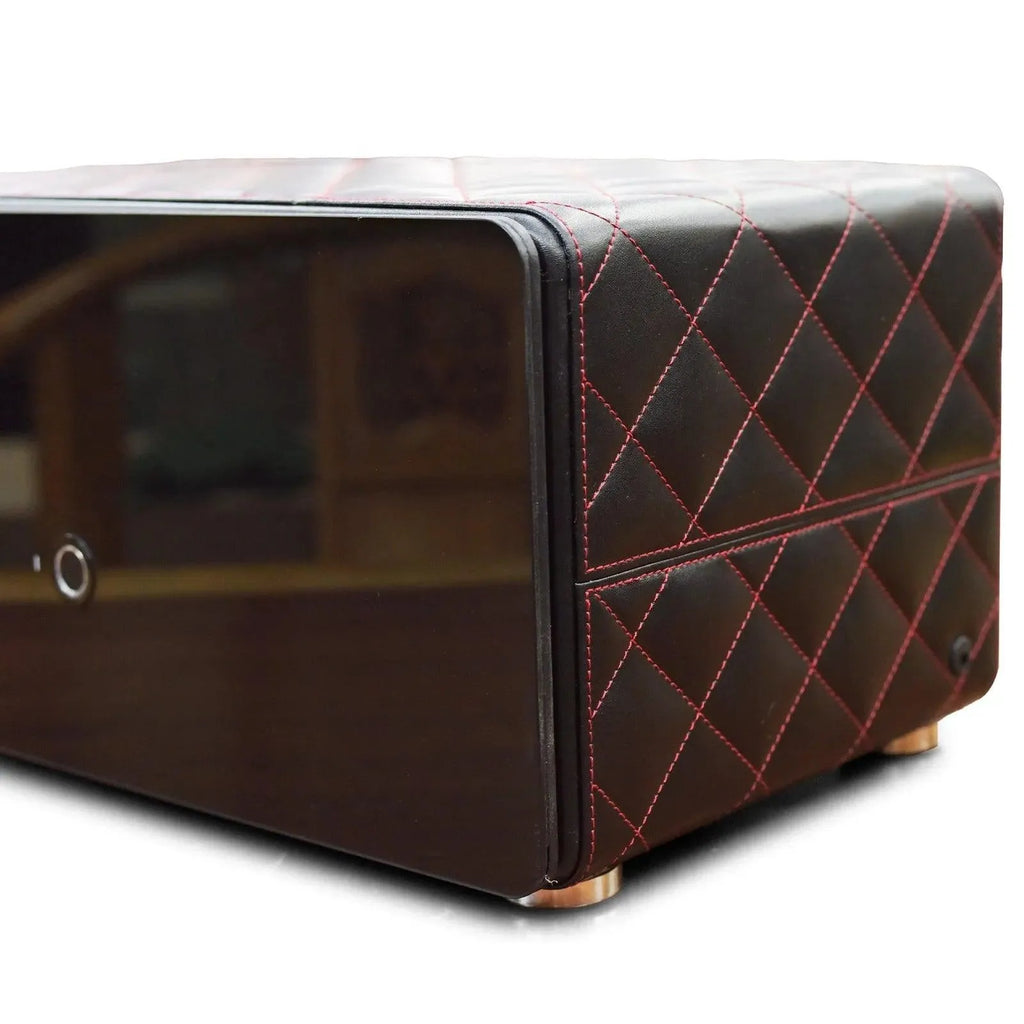 Tempus 8 watch winder safe with black quilted leather, red stitching, and sleek black glass front.