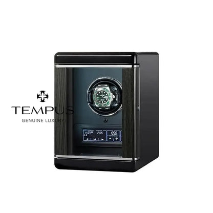 Black watch winder with glass window and watch inside.
