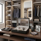 Close-up of a premium 18-watch leather box with visible watch slots in a spacious, stylish dressing room with modern decor.