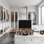 Elevated shot of an open rose gold 24-watch briefcase in a contemporary dressing room with detailed interior and props.