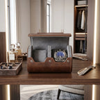 Large view of vintage brown leather watch roll on modern dressing room vanity, highlighting its compact size and elegant environment.