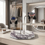 Full view of Tempus marble watch stand with violet veins in stylish bright walk-in dressing area with props.