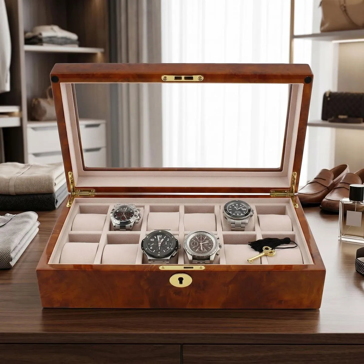 Close-up of 12-watch burl walnut wood box in bright modern dressing room, highlighting craftsmanship and interior compartments.