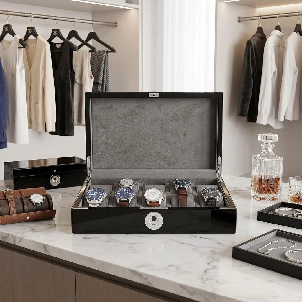 Front view of black piano finish Tempus 10 watch box with biometric lock in a bright luxurious walk-in dressing room, showcasing its sleek design.