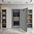 High-resolution photo of a luxury watch winder safe embedded in sleek wall units within a bright, modern dressing room, highlighting its glossy black front and premium leather finish.