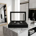 Perspective of the Tempus 10 Watch Box highlighting black oak veneer finish, secure watch slots, and chic dressing room setting.